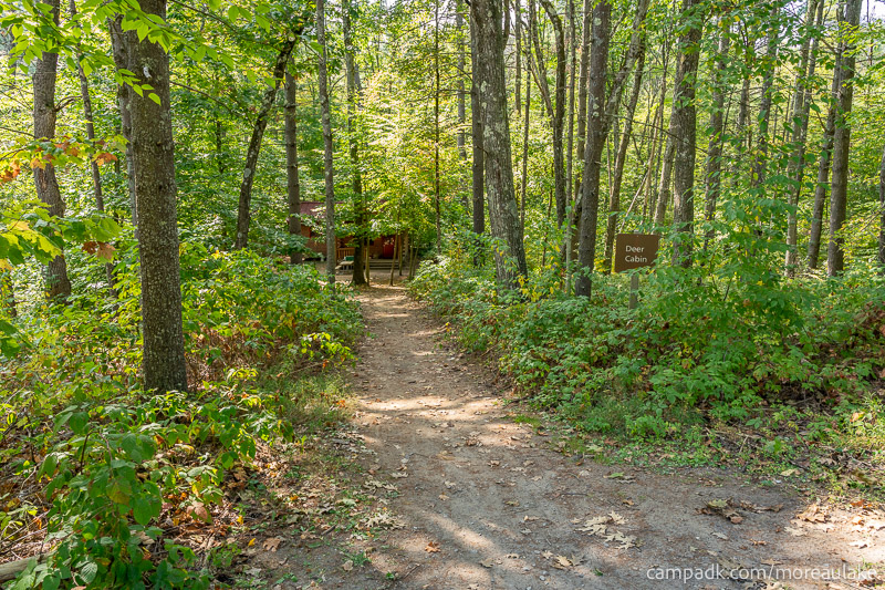 Campsite Photo of Site 1 at Moreau Lake State Park, New York - Looking at Site from Road Sign Visible