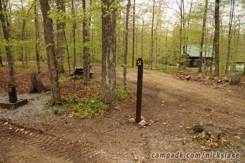 Campsite Photo of Site 51 at Nicks Lake Campground, New York - Looking at Site from Road Sign Visible