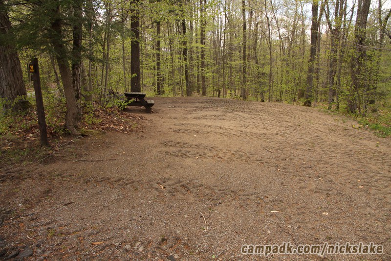 Campsite Photo of Site 21 at Nicks Lake Campground, New York - Looking at Site from Road Sign Visible