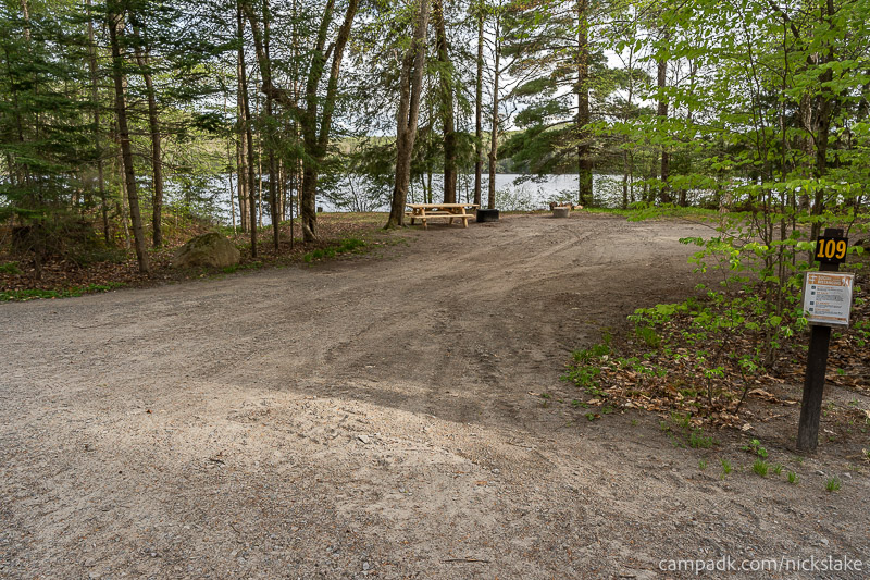 Campsite Photo of Site 109 at Nicks Lake Campground, New York - Looking at Site from Road Sign Visible