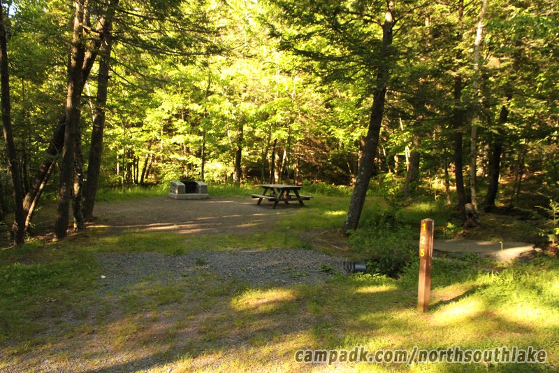 Campsite Photo of Site 125 at North South Lake Campground, New York - Looking at Site from Road Sign Visible