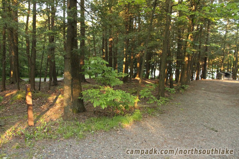 Campsite Photo of Site 64 at North South Lake Campground, New York - Looking at Site from Road Sign Visible
