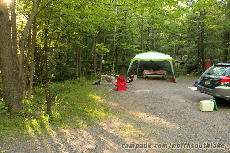 Campsite Photo of Site 39 at North South Lake Campground, New York - Looking at Site from Road Sign Visible