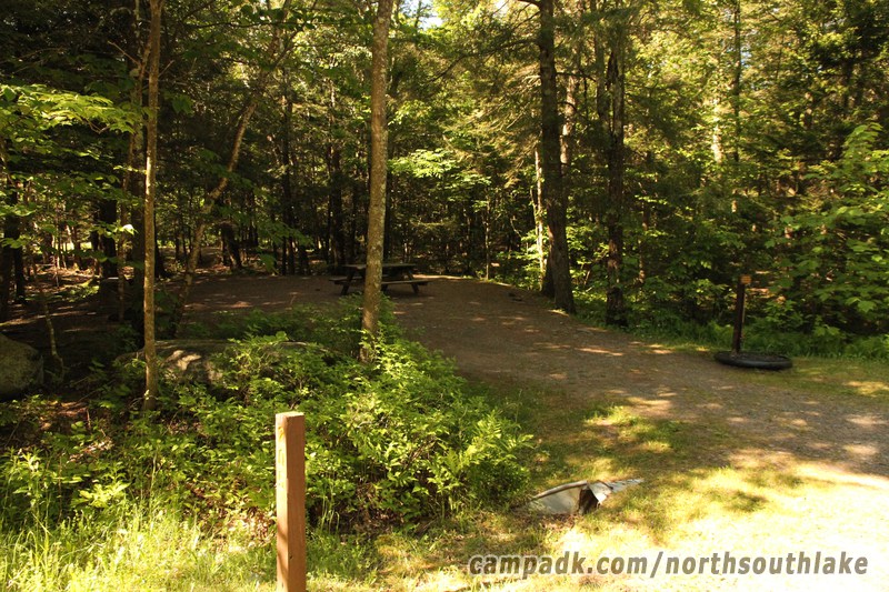 Campsite Photo of Site 205 at North South Lake Campground, New York - Looking at Site from Road Sign Visible