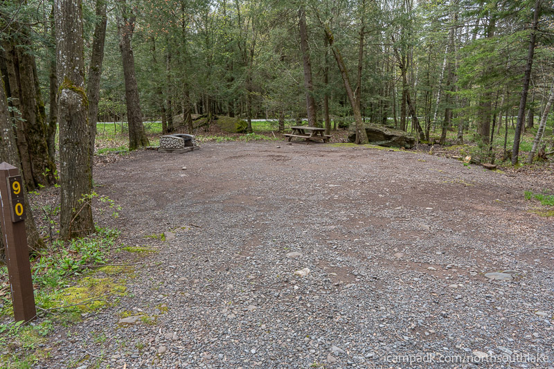 Campsite Photo of Site 90 at North South Lake Campground, New York - Looking at Site from Road Sign Visible