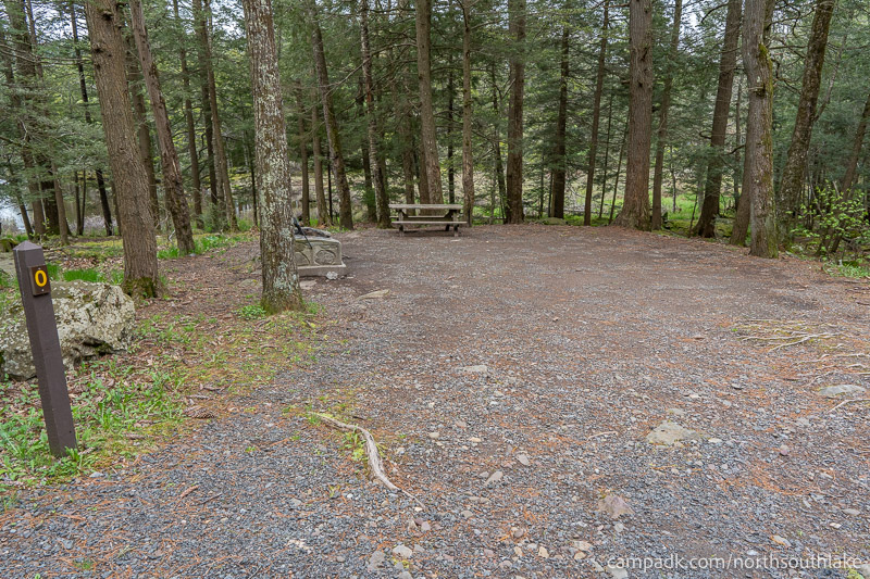 Campsite Photo of Site 0 at North South Lake Campground, New York - Looking at Site from Road Sign Visible
