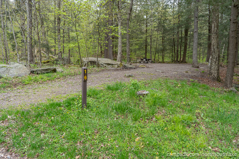 Campsite Photo of Site 16 at North South Lake Campground, New York - Looking at Site from Road Sign Visible