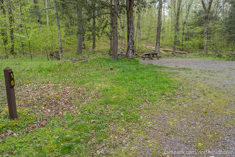 Campsite Photo of Site 18 at North South Lake Campground, New York - Looking at Site from Road Sign Visible
