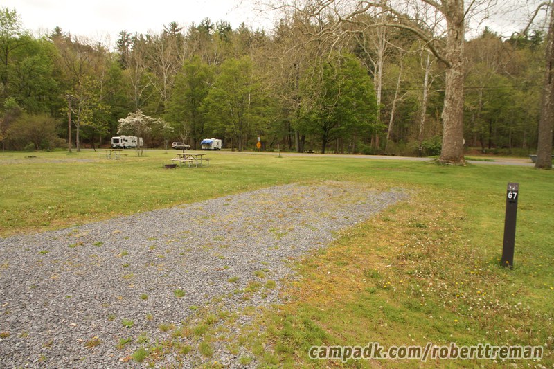 Campsite Photo of Site 67 at Robert H Treman State Park, New York - Looking at Site from Road Sign Visible
