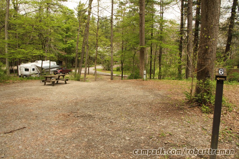 Campsite Photo of Site E6 at Robert H Treman State Park, New York - Looking at Site from Road Sign Visible