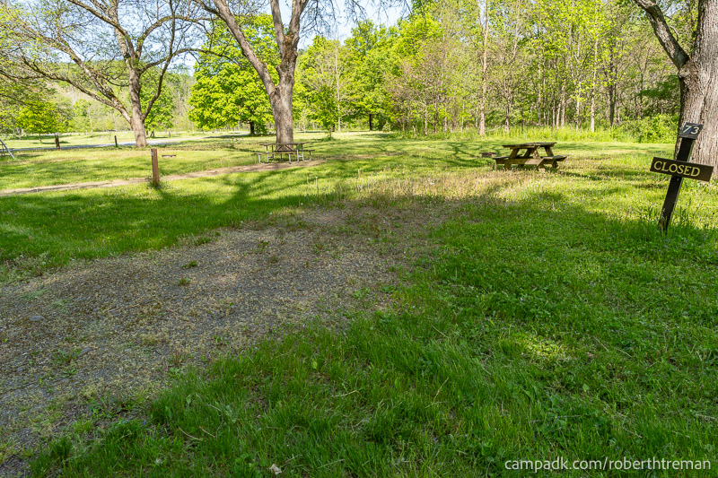 Campsite Photo of Site 73 at Robert H Treman State Park, New York - Looking at Site from Road Sign Visible
