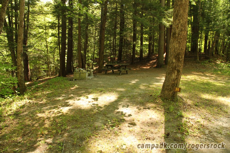Campsite Photo of Site 35 at Rogers Rock Campground, New York - Looking at Site from Road Sign Visible