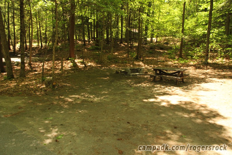 Campsite Photo of Site 65 at Rogers Rock Campground, New York - Looking at Site from Road Sign Visible