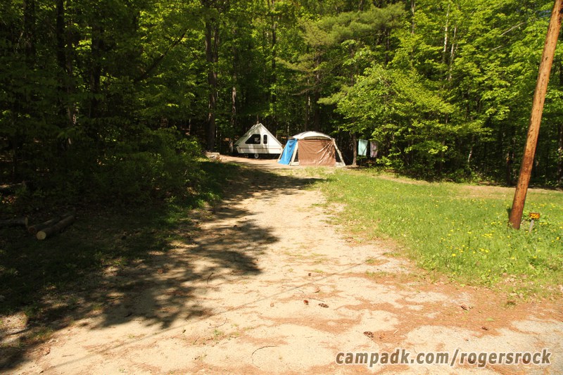 Campsite Photo of Site 256 at Rogers Rock Campground, New York - Looking at Site from Road Sign Visible