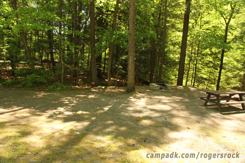 Campsite Photo of Site 25 at Rogers Rock Campground, New York - Looking at Site from Road Sign Visible