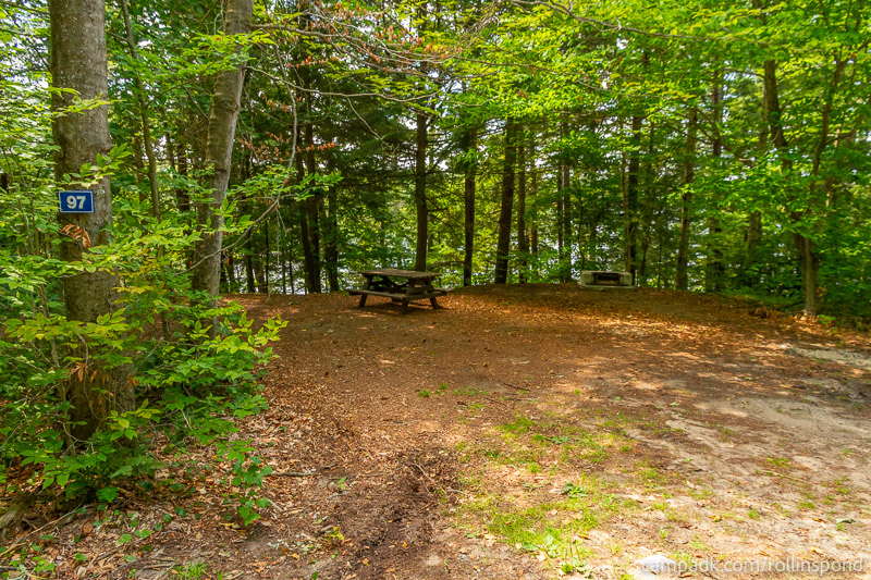 Campsite Photo of Site 97 at Rollins Pond Campground, New York - Looking at Site from Road Sign Visible