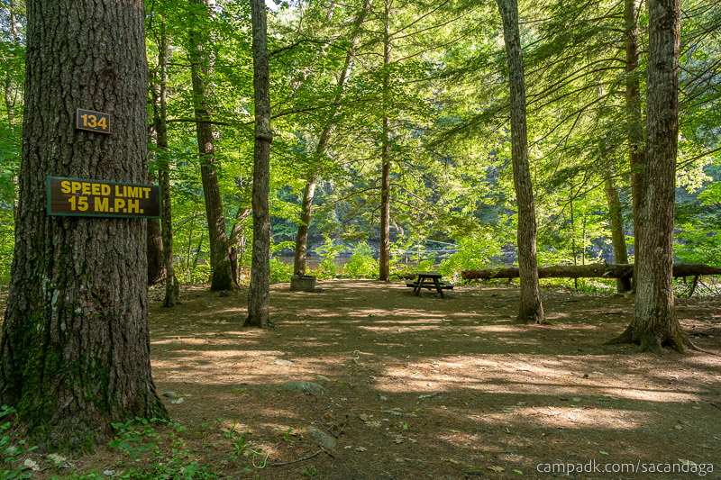 Campsite Photo of Site 134 at Sacandaga Campground, New York - Looking at Site from Road Sign Visible