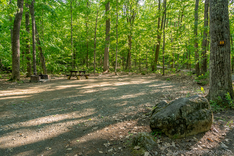 Campsite Photo of Site 89 at Sacandaga Campground, New York - Looking at Site from Road Sign Visible
