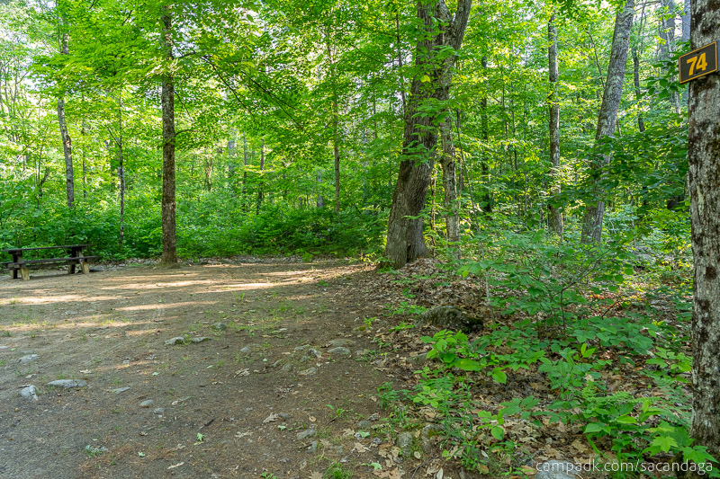 Campsite Photo of Site 74 at Sacandaga Campground, New York - Looking at Site from Road Sign Visible