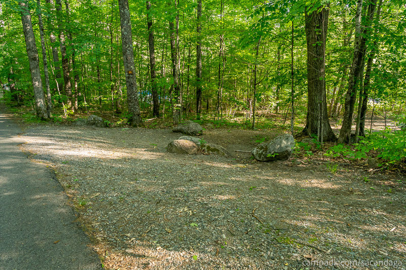 Campsite Photo of Site 99 at Sacandaga Campground, New York - Looking at Site from Road Sign Visible