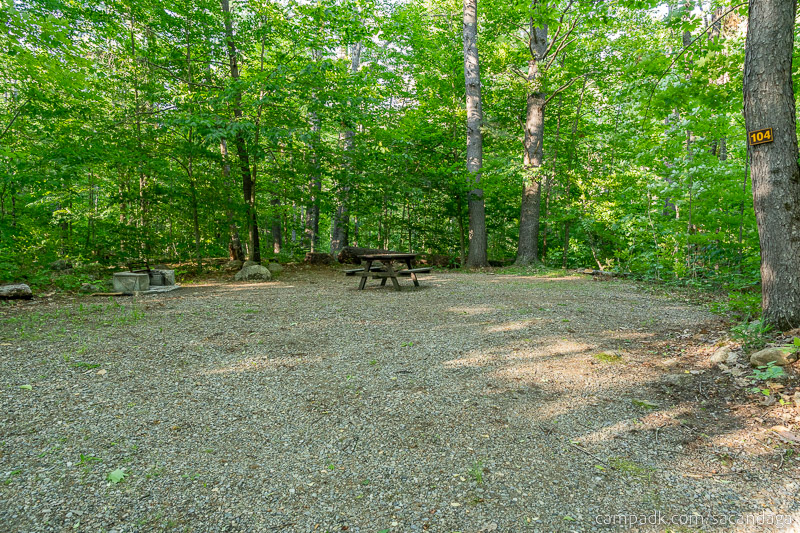Campsite Photo of Site 104 at Sacandaga Campground, New York - Looking at Site from Road Sign Visible
