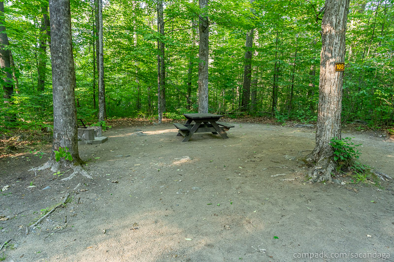 Campsite Photo of Site 109 at Sacandaga Campground, New York - Looking at Site from Road Sign Visible