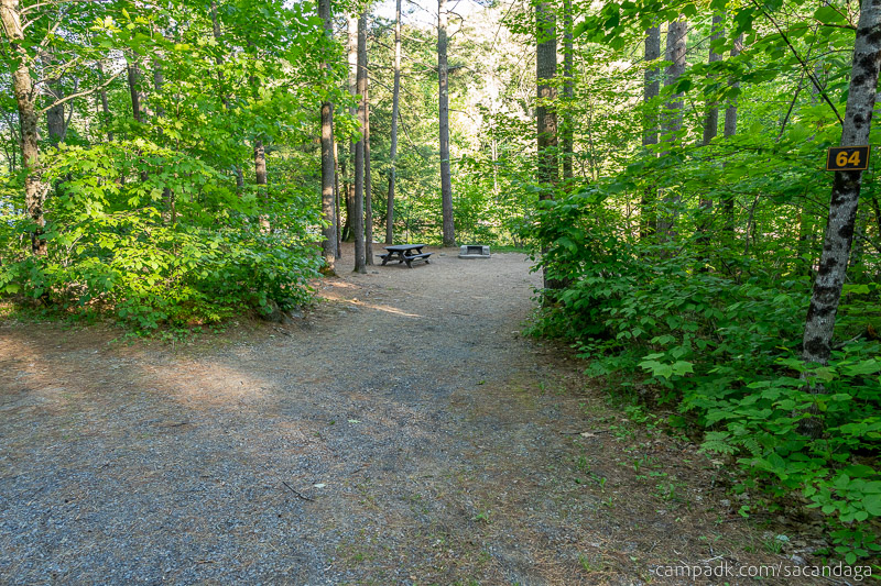 Campsite Photo of Site 64 at Sacandaga Campground, New York - Looking at Site from Road Sign Visible