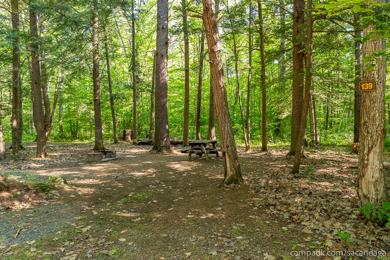 Campsite Photo of Site 139 at Sacandaga Campground, New York - Looking at Site from Road Sign Visible