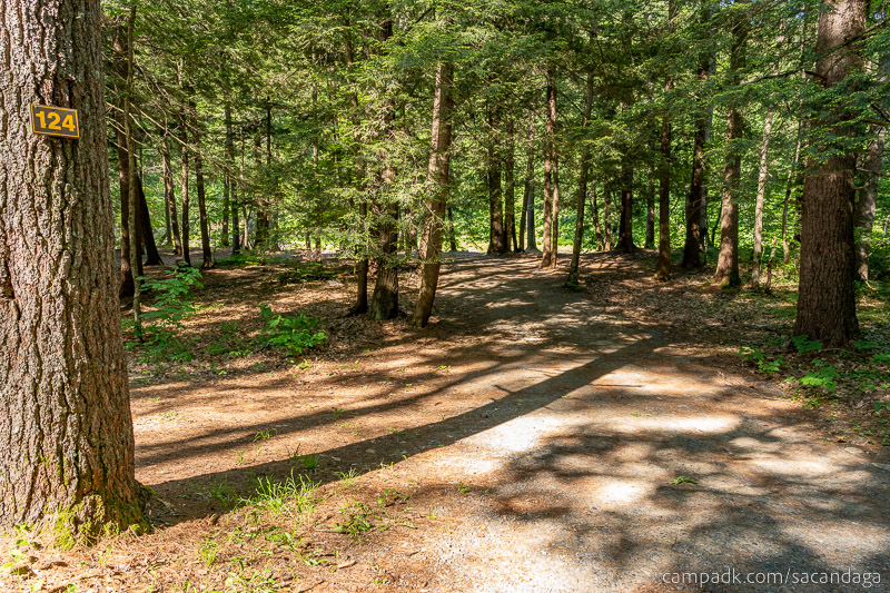 Campsite Photo of Site 124 at Sacandaga Campground, New York - Looking at Site from Road Sign Visible