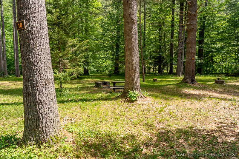 Campsite Photo of Site 18 at Sacandaga Campground, New York - Looking at Site from Road Sign Visible