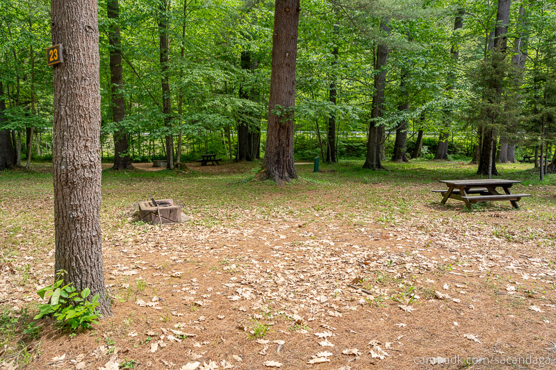Campsite Photo of Site 23 at Sacandaga Campground, New York - Looking at Site from Road Sign Visible