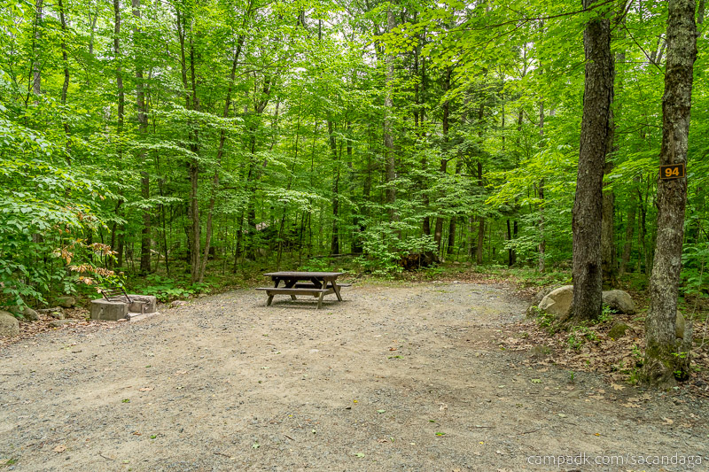 Campsite Photo of Site 94 at Sacandaga Campground, New York - Looking at Site from Road Sign Visible