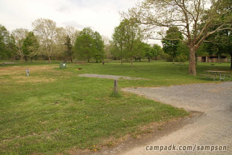 Campsite Photo of Site 77 at Sampson State Park, New York - Looking at Site from Road Sign Visible