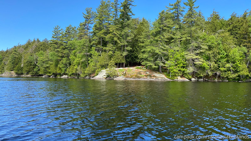 Campsite Photo of Site 34 at Saranac Lake Islands Campground, New York - View From Water on Approach