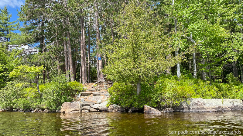 Campsite Photo of Site 37 at Saranac Lake Islands Campground, New York - View From Water on Approach