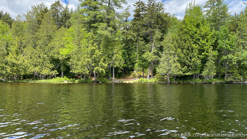 Campsite Photo of Site 44 at Saranac Lake Islands Campground, New York - View From Water on Approach