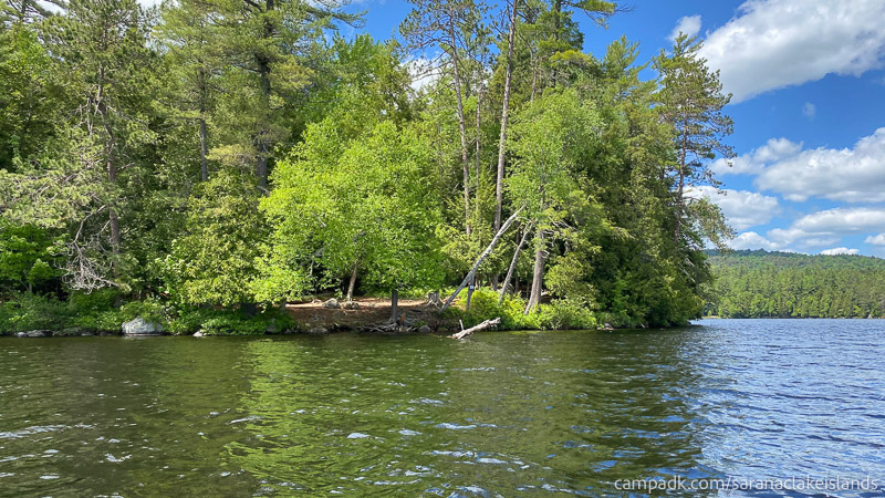 Campsite Photo of Site 29 at Saranac Lake Islands Campground, New York - View From Water on Approach