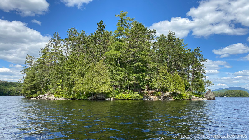 Campsite Photo of Site 28 at Saranac Lake Islands Campground, New York - View From Water on Approach
