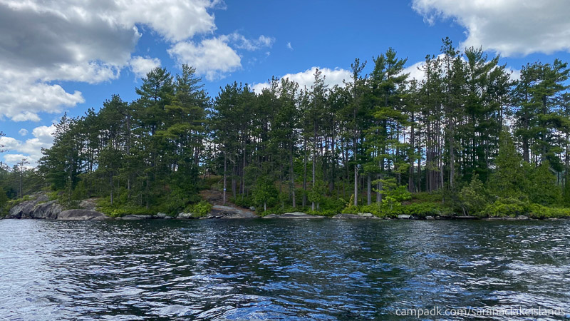 Campsite Photo of Site 27 at Saranac Lake Islands Campground, New York - View From Water on Approach