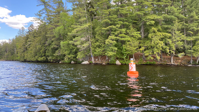 Campsite Photo of Site 11 at Saranac Lake Islands Campground, New York - View From Water on Approach