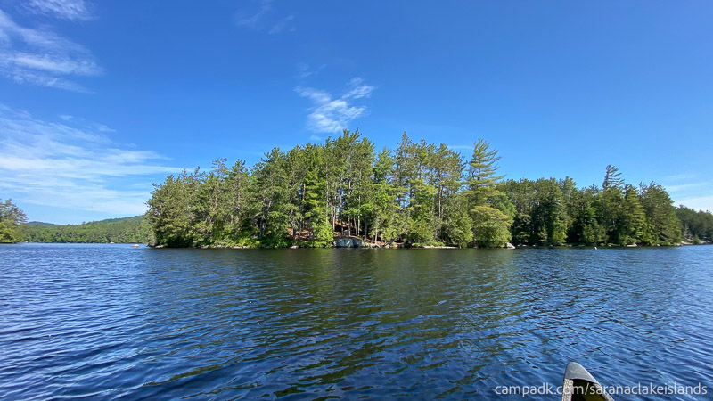 Campsite Photo of Site 21 at Saranac Lake Islands Campground, New York - View From Water on Approach