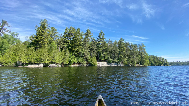 Campsite Photo of Site 13 at Saranac Lake Islands Campground, New York - View From Water on Approach