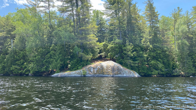 Campsite Photo of Site 4 at Saranac Lake Islands Campground, New York - View From Water on Approach