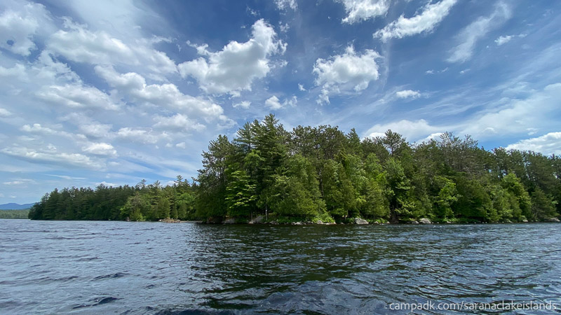 Campsite Photo of Site 18 at Saranac Lake Islands Campground, New York - View From Water on Approach