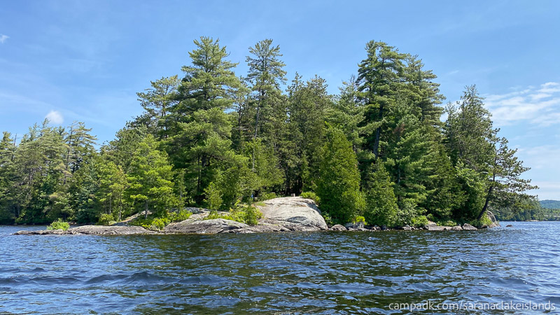 Campsite Photo of Site 7 at Saranac Lake Islands Campground, New York - View From Water on Approach