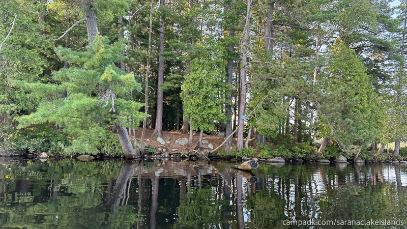 Campsite Photo of Site 33 at Saranac Lake Islands Campground, New York - View From Water on Approach