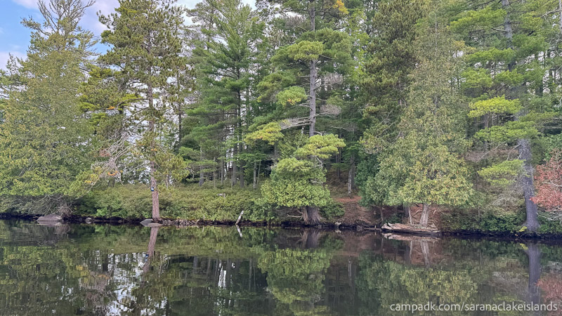 Campsite Photo of Site 56 at Saranac Lake Islands Campground, New York - View From Water on Approach