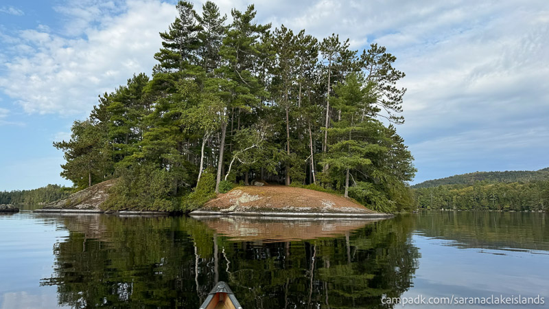 Campsite Photo of Site 23 at Saranac Lake Islands Campground, New York - View From Water on Approach