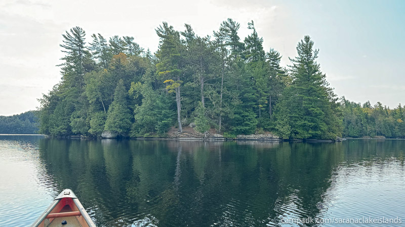 Campsite Photo of Site 19 at Saranac Lake Islands Campground, New York - View From Water on Approach