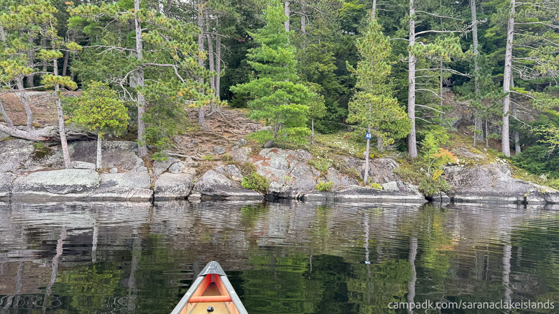 Campsite Photo of Site 48 at Saranac Lake Islands Campground, New York - View From Water on Approach